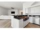 Modern kitchen with granite countertops, stainless steel appliances, and a copper farmhouse sink at 6700 E Caron Dr, Paradise Valley, AZ 85253