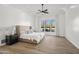 Serene primary bedroom with neutral tones, tray ceilings, and large windows with scenic views at 6700 E Caron Dr, Paradise Valley, AZ 85253