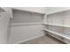 Walk-in closet with shelving, providing ample storage space at 701 Dylan Ct, Wickenburg, AZ 85390