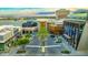 Aerial view of modern shopping center with unique architecture, palm trees, and upscale dining options at 7151 E Rancho Vista Dr # 1003, Scottsdale, AZ 85251