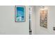 Modern hallway with stylish digital art and recessed lighting at 7151 E Rancho Vista Dr # 1003, Scottsdale, AZ 85251