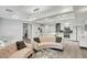Bright, open living room with modern decor flowing into the kitchen at 7151 E Rancho Vista Dr # 1003, Scottsdale, AZ 85251