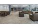Inviting lounge area with comfortable seating and tables, perfect for relaxation and socializing at 7151 E Rancho Vista Dr # 1003, Scottsdale, AZ 85251