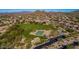 Aerial view of a community park with a basketball court, playground, and green space at 7424 E Sandia Cir, Mesa, AZ 85207