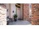 Inviting front porch with decorative stone accents and stylish decor at 7424 E Sandia Cir, Mesa, AZ 85207