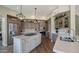 Modern kitchen featuring stainless steel appliances, stone countertops and gray cabinets at 7424 E Sandia Cir, Mesa, AZ 85207