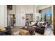 Comfortable living room featuring large windows, and a cozy seating arrangement at 7424 E Sandia Cir, Mesa, AZ 85207