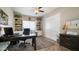 Home office space with a desk, chair, and bookshelves at 7424 E Sandia Cir, Mesa, AZ 85207