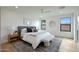Relaxing bedroom with natural light, hardwood floors and neutral decor at 7801 N 4Th Pl, Phoenix, AZ 85020