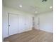 Bright bedroom with hardwood floors, white walls and closet at 7801 N 4Th Pl, Phoenix, AZ 85020