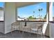 Relaxing front porch with comfortable seating and a view of the serene neighborhood at 7801 N 4Th Pl, Phoenix, AZ 85020