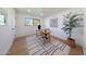 Bright home office with a wooden desk, stylish decor and neutral color palette at 7801 N 4Th Pl, Phoenix, AZ 85020