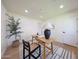 Bright home office with hardwood floors, neutral color palette, modern desk and stylish decor at 7801 N 4Th Pl, Phoenix, AZ 85020