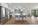 Bright, modern kitchen features stainless appliances, white cabinetry, and a large marble island at 7801 N 4Th Pl, Phoenix, AZ 85020