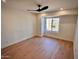 Comfortable bedroom with hardwood floors, a ceiling fan, and windows provides a relaxing atmosphere at 7955 E Chaparral Rd # 34, Scottsdale, AZ 85250