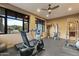 Invigorating home gym with natural light, fitness machines, rubber floors, and an inspiring workout environment at 8724 N 68Th St, Paradise Valley, AZ 85253
