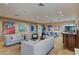 Bright open-concept living room with hardwood floors and views into the dining area at 8724 N 68Th St, Paradise Valley, AZ 85253