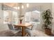 Charming dining area with a light-filled window and stylish pendant lighting at 8850 W Piute Ave, Peoria, AZ 85382