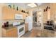 Bright eat-in kitchen with wood floors, granite counters, and modern appliances at 8850 W Piute Ave, Peoria, AZ 85382