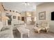 Comfortable living room featuring an open floor plan and a neutral color scheme at 8850 W Piute Ave, Peoria, AZ 85382