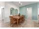 Cozy dining room featuring rustic wood table set with seating for eight at 11121 E Onza Ave, Mesa, AZ 85212