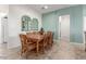 View of dining table with decorative wall art at 11121 E Onza Ave, Mesa, AZ 85212