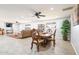 Open-concept dining area flows into the living room offering a versatile space for entertaining at 11446 W Hidalgo Ave, Tolleson, AZ 85353