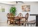 Elegant dining room highlighted by stylish furniture and a large window for natural lighting at 11446 W Hidalgo Ave, Tolleson, AZ 85353