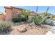 This property features desert landscaping and rock accents in the front yard at 17743 W Verdin Rd, Goodyear, AZ 85338