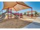 Fun playground with slides and shade structures, perfect for Gathering activities and enjoyment at 17743 W Verdin Rd, Goodyear, AZ 85338