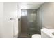 Clean and modern bathroom featuring a glass-enclosed shower, tiled walls, and sleek fixtures at 2030 N 17Th Ave, Phoenix, AZ 85007