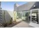 Private patio featuring desert landscaping, minimalist design, and a seamless transition from indoor living through large sliding door at 2030 N 17Th Ave, Phoenix, AZ 85007