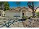 Charming single-story home features a three-car garage and a well-maintained front yard with desert landscaping at 20615 N 55Th Ave, Glendale, AZ 85308