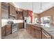 Well-equipped kitchen featuring stainless steel appliances, ample counter space, and stylish cabinetry at 20615 N 55Th Ave, Glendale, AZ 85308