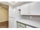 Kitchen featuring a refrigerator with modern countertops and cabinetry at 2338 W Lindner Ave # 22, Mesa, AZ 85202