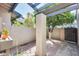 A cozy outdoor patio with a pergola for shade and relaxation at 2338 W Lindner Ave # 22, Mesa, AZ 85202