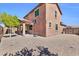 This home's backyard features a covered patio, basketball hoop and pavers at 314 N 79Th Pl, Mesa, AZ 85207