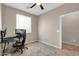 Bright bedroom with tile flooring, a ceiling fan, and a window with white blinds at 314 N 79Th Pl, Mesa, AZ 85207