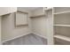 Walk-in closet with carpet, shelving, and hanging storage space at 314 N 79Th Pl, Mesa, AZ 85207