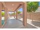 A covered patio with large columns offers a spot for relaxing outdoors at 314 N 79Th Pl, Mesa, AZ 85207