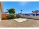 Backyard featuring desert landscaping, block fencing, and a concrete slab at 3601 N 12Th St, Phoenix, AZ 85014