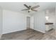 Bright main bedroom boasts wood-look flooring and a doorway to an ensuite bathroom at 3601 N 12Th St, Phoenix, AZ 85014