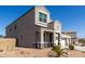 Attractive two-story home with desert landscaping and a spacious three-car garage at 3932 N 306Th Ln, Buckeye, AZ 85396