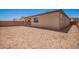 Spacious dirt backyard, ready to be customized for landscaping or outdoor living at 40546 W Michaels Dr, Maricopa, AZ 85138