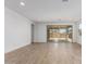 Spacious living area with sliding glass doors to outdoor patio at 40546 W Michaels Dr, Maricopa, AZ 85138