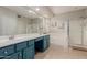 Bright bathroom featuring a double sink vanity, soaking tub, and glass-enclosed shower at 4801 E Quien Sabe Way, Cave Creek, AZ 85331