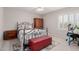 Cozy bedroom with iron frame bed, stylish rug, and warm neutral tones at 4801 E Quien Sabe Way, Cave Creek, AZ 85331