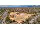 Aerial view of the community park featuring walking paths, open spaces, and sports courts at 4801 E Quien Sabe Way, Cave Creek, AZ 85331