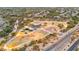 Aerial view showcasing a community park with playground, picnic areas, and walking paths near residential homes at 4801 E Quien Sabe Way, Cave Creek, AZ 85331