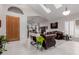 Bright foyer features tile flooring, modern furnishings, and views into the adjacent living spaces at 4801 E Quien Sabe Way, Cave Creek, AZ 85331